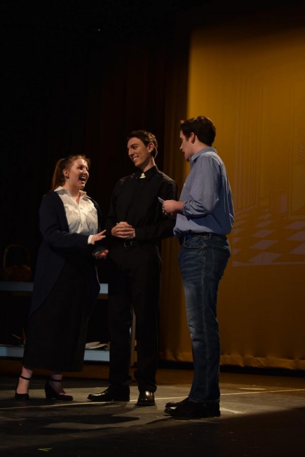 Sophie Stapleton, Henry Trochlil, and Jack Powell rehearse for the show (Photo by Riley Draddy)