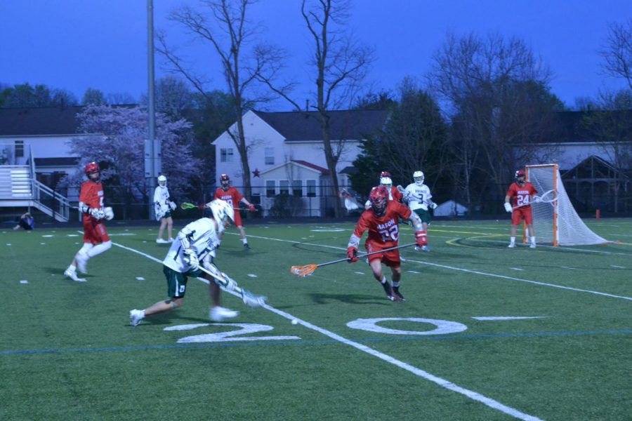 Loudoun Valley Boy Varsity Lacrosse on Tuesday, April 8
People in photo: Robby Adams #0