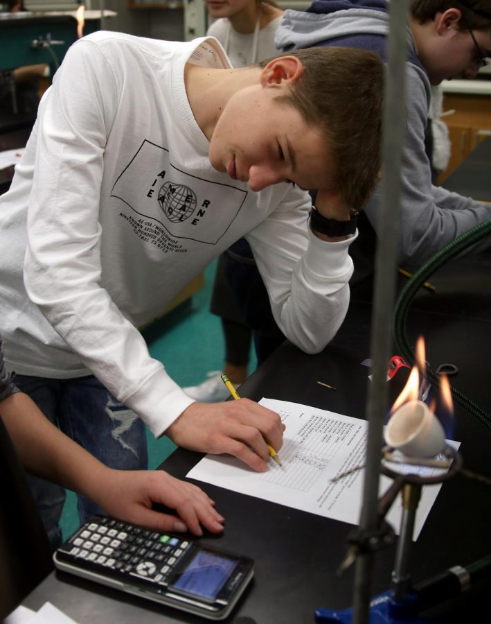 Truman Abbe gets stumped on a question during his hydrate lab in Sunila Boses chemistry class. 