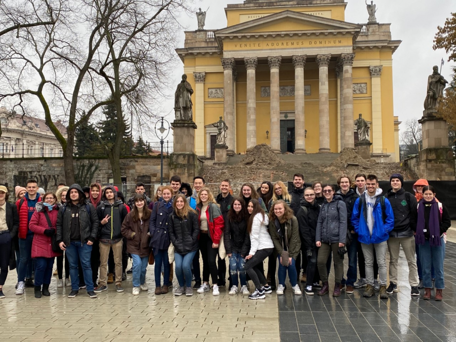 Students and chaperones pose for a group picture in Hungary