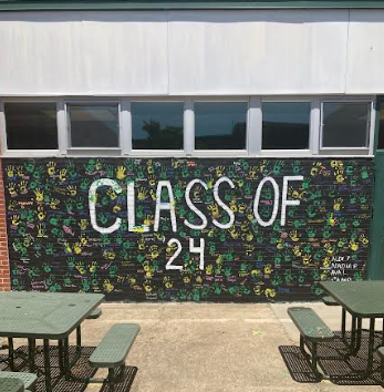 Senior handprint wall outside the cafeteria. 