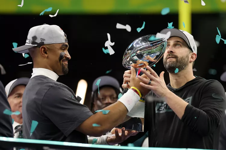 Jalen Hurts and Nick Sirianni holding the Lombardi Trophy, Feb. 9